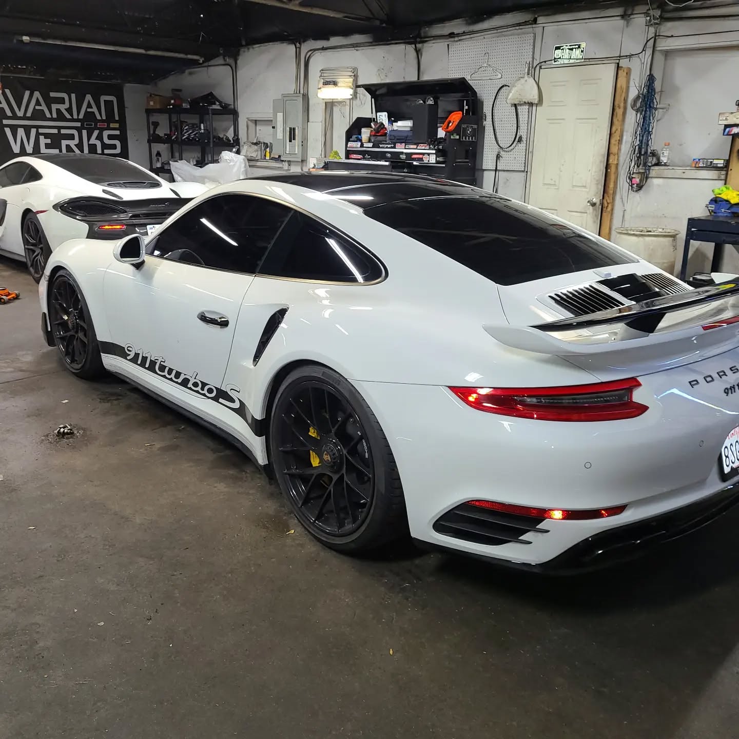 Mercedes AMG and luxury European vehicles in professional service facility