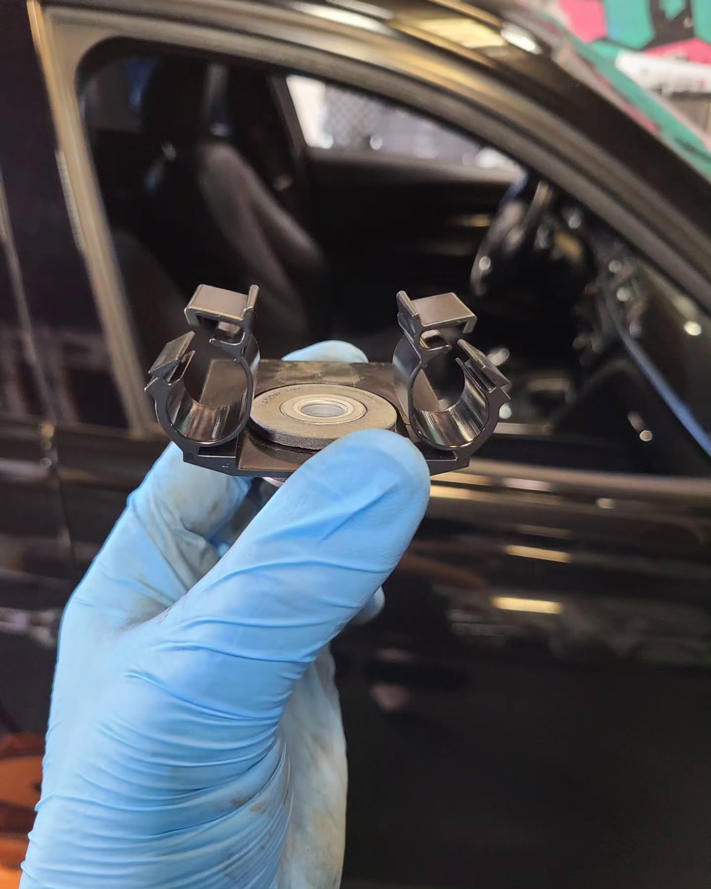 Senior BMW technician explaining diagnostic details and transparent communication