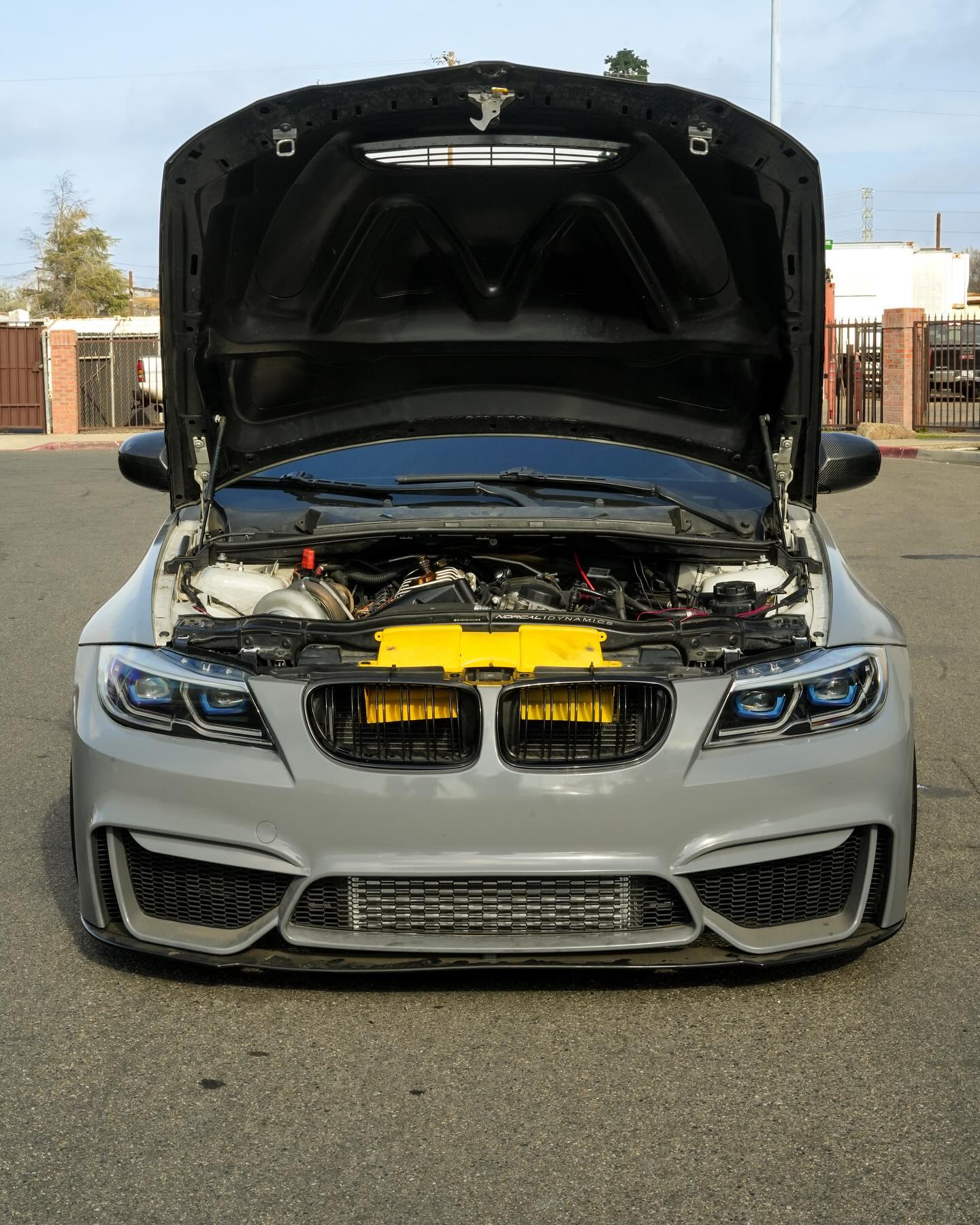BMW M-series engine bay with performance modifications and M badge